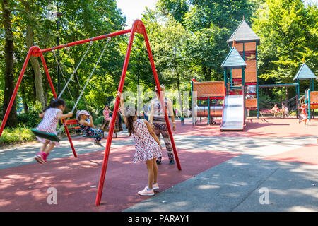 Large playground, big slide, Ciani Park, Lugano, Lake Lugano, Switzerland freedom concept, best life, childhood concept kids playing playground Stock Photo