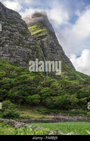 Cascata do Poço do Bacalhau, a waterfall on the Azores island of Flores, Portugal. Stock Photo