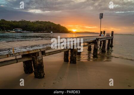 Sunset from Little beach pier in Port Stephens and Nelson Bay, Australia Stock Photo