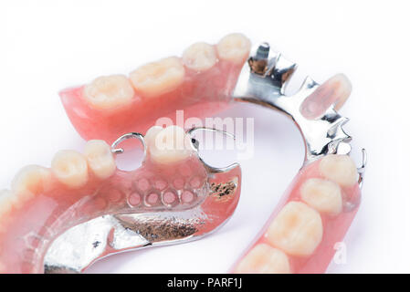 Partial denture upper side on a white background Stock Photo