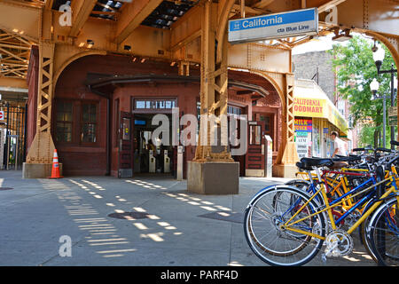 Commuter bicycles are parked outside the entrance to the California L Train Station on Chicago's Blue Line in the Logan Square neighborhood. Stock Photo