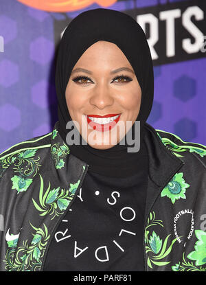 SANTA MONICA, CA - JULY 19: Ibtihaj Muhammad arrives at the Nickelodeon Kids' Choice Sports Awards 2018 at Barker Hangar on July 19, 2018 in Santa Monica, California. Stock Photo