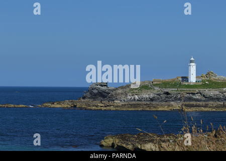 Godrevy Lighthouse,built by Trinity House in 1859 marking a dangerous reef off St. Ives called the Stones. Cornwall. UK. Stock Photo
