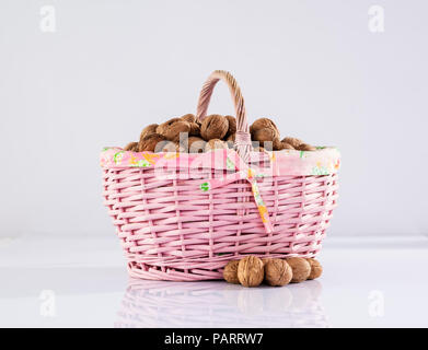 Nuts in basket Stock Photo