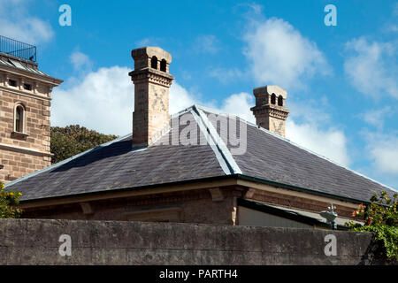 Sydney Australia, roof top and chimneys of cottage at Observatory Hill Stock Photo