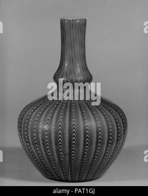 Vase. Culture: British (American market). Dimensions: H. 7 1/2 in. (19.1 cm); Diam. 5 1/4 in. (13.3 cm). Maker: Probably Stevens and Williams. Date: ca. 1885. Museum: Metropolitan Museum of Art, New York, USA. Stock Photo