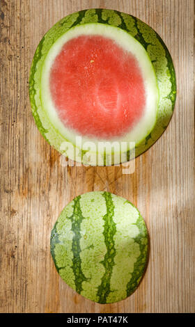 top cut off fresh watermelon on wood background Stock Photo