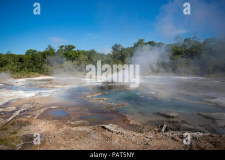 Papua New Guinea, Dei Dei Hot Springs, Fergusson Island. steam rising from a hot spring. Stock Photo