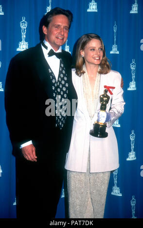 LOS ANGELES, CA - MARCH 30: Actor Michael Douglas and actress Jodie Foster attend the 64th Annual Academy Awards on March 30, 1992 at the Dorothy Chandler Pavilion in Los Angeles, California. Photo by Barry King/Alamy Stock Photo Stock Photo