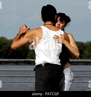 watercolored photograph of two young people dancing the tango.  in hold Stock Photo