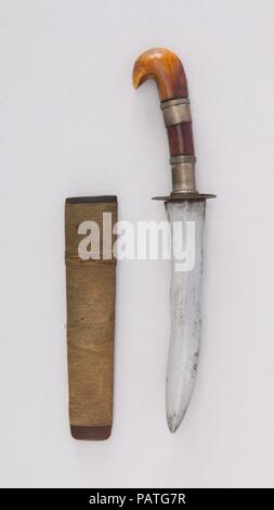 Dagger with Sheath. Culture: Philippine, Mindanao. Dimensions: H. with sheath 9 1/4 in. (23.5 cm); H. without sheath 9 in. (22.9 cm); W. 1 3/4 in. (4.5 cm); Wt. 3.1 oz. (87.9 g); Wt. of sheath 0.6 oz. (17 g). Date: 19th century. Museum: Metropolitan Museum of Art, New York, USA. Stock Photo