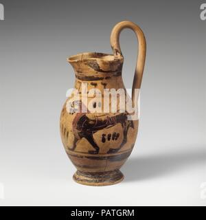 Terracotta oinochoe: olpe (jug). Culture: Greek, Attic. Dimensions: 6 3/4in. (17.1cm)  Other (height with handle): 6 3/4in. (17.1cm). Date: 1st half of 6th century B.C..  Two panthers. Museum: Metropolitan Museum of Art, New York, USA. Stock Photo