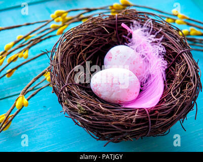 Easter decoration, Easter eggs twigs on wood Stock Photo