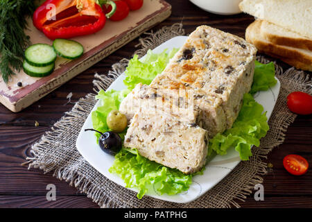 Thanksgiving Turkey dinner. Cupcake casserole with turkey meat and mushrooms on a wooden table. The concept of food on thanksgiving. Stock Photo