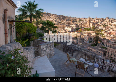 A view over the medieval town of Modica, a Baroque UNESCO World Heritage listed town in Sicily, from Casa Talia, a boutique hotel. Stock Photo