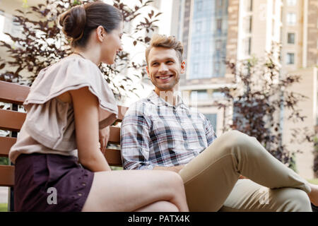 Nice young couple having a conversation Stock Photo