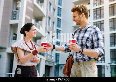 Nice happy colleagues having a coffee break Stock Photo