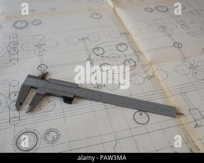 traditional vernier caliper on a vintage hand drawn technical drawing Stock Photo