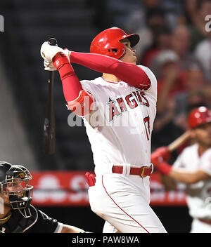 Los Angeles Angels designated hitter Shohei Ohtani hits a solo home run in the fourth inning during the Major League Baseball game against the Chicago White Sox at Angel Stadium in Anaheim, California, United States, July 23, 2018. Credit: AFLO/Alamy Live News Stock Photo