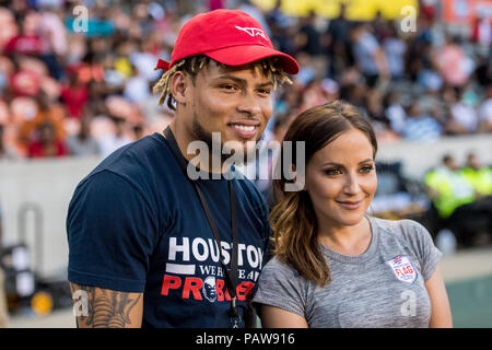 Houston, TX, USA. 19th July, 2018. NFL player Tyrann Mathieu poses for a photo with sideline reporter Kay Adams during the American Flag Football League Ultimate Final between Godspeed and Fighting Cancer at BBVA Compass Stadium in Houston, TX. Fighting Cancer won the game 26 to 6.Trask Smith/CSM/Alamy Live News Stock Photo