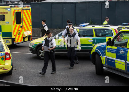 London, UK, 25 July 2018. Old Street Bike accident . 25.07.2018 Emergency arriving at the scene where a cyclist collided with a concrete lorry on Old Street roundabout this afternoon. Credit: Clickpics/Alamy Live News