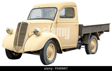 Vintage pickup truck with wooden tail end payload on isolated white background and clipping path. Stock Photo