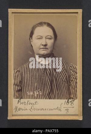 Bertout. Marie, Ismérie. 41 ans, née à Reims. Marchande de vins. Pas de motif. 26/2/94. Artist: Alphonse Bertillon (French, 1853-1914). Dimensions: 10.5 x 7 x 0.5 cm (4 1/8 x 2 3/4 x 3/16 in.) each. Date: 1894.  Born into a distinguished family of scientists and statisticians, Bertillon began his career as a clerk in the Identification Bureau of the Paris Prefecture of Police in 1879. Tasked with maintaining reliable police records of offenders, he developed the first modern system of criminal identification. The system, which became known as Bertillonage, had three components: anthropometric  Stock Photo