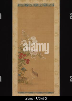 Quail and Autumn Flowers. Artist: Tosa Mitsuoki (Japanese, 1617-1691). Culture: Japan. Dimensions: 38 1/2 x 16 3/8 in. (97.8 x 41.6 cm). Date: late 17th century.  Elegant in their own right, chrysanthemums often appear together with quails in paintings. The combination was especially favored by Southern Song Chinese artists, as it signified peace and longevity. Along with chysanthemums, the depiction of other autumn flowers, such as bush clover (hagi) and Chinese bellflowers (kikyo), creates a seasonal setting for the pair of birds.  The painting is signed by Tosa Mitsuoki, a master of jewel-l Stock Photo