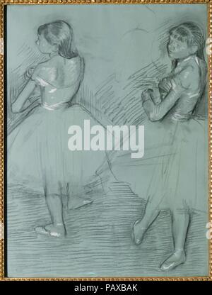 Two Dancers. Artist: Edgar Degas (French, Paris 1834-1917 Paris). Dimensions: 25 1/8 x 19 1/4 in. (63.8 x 48.9 cm). Date: ca. 1879.  Marie van Goethem, who posed for Degas's sculpture <i>The Little Fourteen-Year-Old Dancer</i>, was the model for these two fine studies of a dancer adjusting her shoulder strap. Degas often used commercially coated paper for his drawings of dancers; this sheet retains its original color. Museum: Metropolitan Museum of Art, New York, USA. Stock Photo