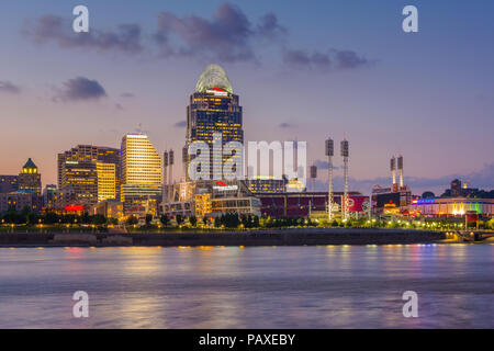 The Cincinnati skyline and Ohio River at night, seen from Covington, Kentucky, Stock Photo