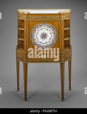 Drop-front desk (secrétaire à abattant or secrétaire en cabinet). Culture: French, Paris and Sèvres. Dimensions: Overall: 50 1/2 × 33 5/8 × 14 in. (128.3 × 85.4 × 35.6 cm). Factory: Porcelain plaques by Sèvres Manufactory (French, 1740-present). Maker: Attributed to Roger Vandercruse, called Lacroix (French, 1727-1799). Date: porcelain ca. 1764, secretary ca. 1775.  Several related secretaries are known that have either a porcelain plaque or a marquetry roundel on the fall front and are signed or attributed to Roger Vandercruse. The son of a Flemish cabinetmaker, Vandercruse also used the Fren Stock Photo