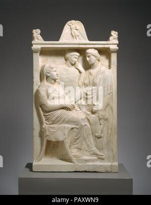 Marble stele (grave marker) of a woman. Culture: Greek, Attic. Dimensions: H. 54 in. (137.2 cm). Date: ca. 375-350 B.C..  The incomplete inscription makes clear that the seated woman is the daughter of a man from the deme (political district) of Sounion in Attica; the standing woman is named Philte. Museum: Metropolitan Museum of Art, New York, USA. Stock Photo