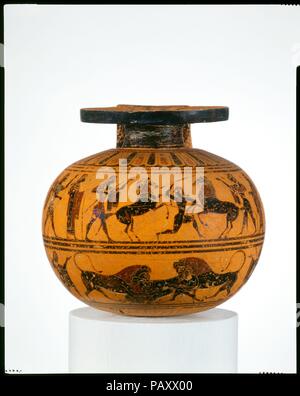 Terracotta aryballos (oil flask). Culture: Greek, Attic. Dimensions: H. 3 1/4 in. (8.3 cm)  diameter  3 1/2 in. (8.9 cm). Date: ca. 550 B.C..  On the handle, Dionysos and two revelers  Upper frieze, horse tamer between onlookers and two wrestlers  Lower frieze, animal combats between onlookers  The aryballos is connected with the gymnasium and the palaistra (exercise ground).  After exercising, men used oil to clean and care for their skin. The subjects here refer to major interests of young Athenians--horses, athletics, and symposia (drinking party). Museum: Metropolitan Museum of Art, New Yo Stock Photo