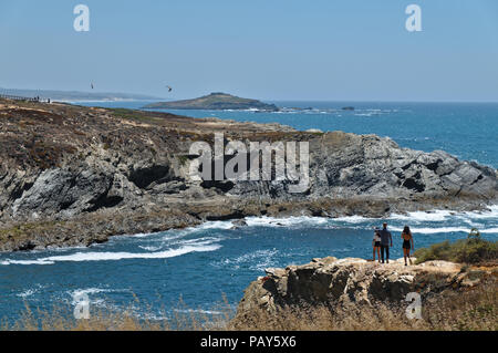 People visiting the cliffs of Porto Covo. Alentejo, Portugal Stock Photo