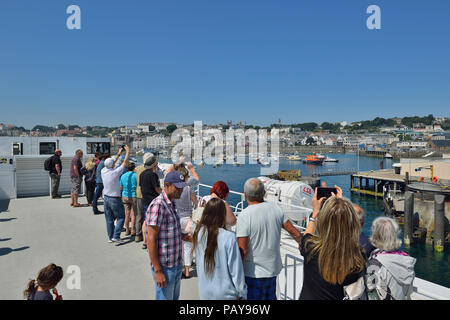 Ferry passengers arriving at St Peter Port, Guernsey, Channel Islands Stock Photo