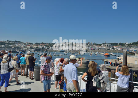 Ferry passengers arriving at St Peter Port, Guernsey, Channel Islands Stock Photo