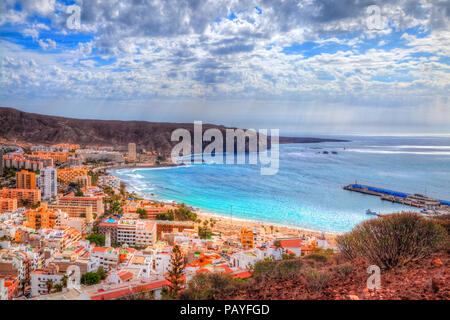 Los Cristianos beach and Adeje coastline in summer holiday, in Tenerife, Spain Stock Photo