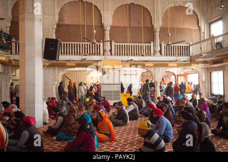 DELHI, INDIA - JAN 18, 2016: Interior of the Gurdwara Bangla Sahib, is the main Sikh temple in India. It's known for its association with the eighth S Stock Photo