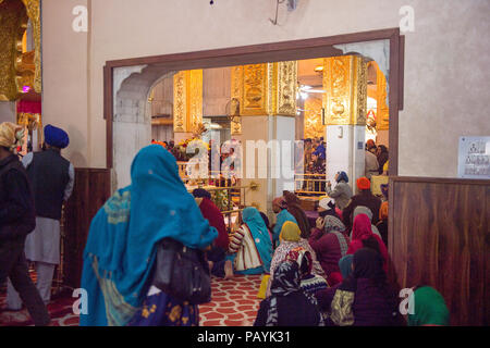 DELHI, INDIA - JAN 18, 2016: Interior of the Gurdwara Bangla Sahib, is the main Sikh temple in India. It's known for its association with the eighth S Stock Photo