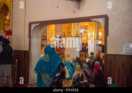 DELHI, INDIA - JAN 18, 2016: Interior of the Gurdwara Bangla Sahib, is the main Sikh temple in India. It's known for its association with the eighth S Stock Photo