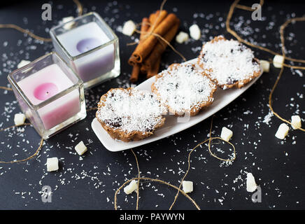 coconut muffins on a black background Stock Photo