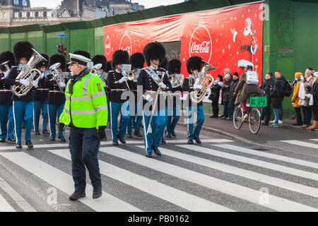 Copenhagen, Denmark - December 9, 2017: The procession of the royal guardsmen to royal palace Amalienborg, accompanied by the orchestra. The ceremony  Stock Photo