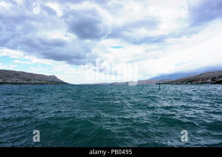 Dramatic sky and waves on the Adriatic sea, during the northern to north-eastern katabatic strong and stormy wind named Bora, in the Island of Pag and