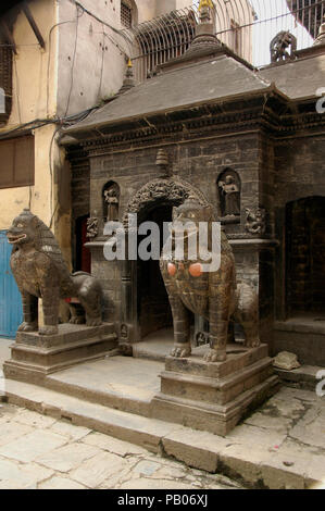 Taken in Patan district of Kathmandu, this is one of several temples visited by locals and tourists, Nepal Stock Photo