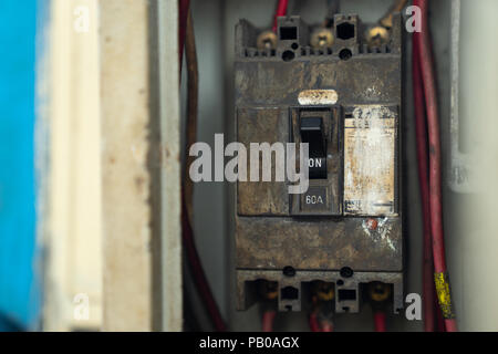 old and dirty Breakers switch in electric box, circuit breakers, electrical panel, switch with wires Stock Photo