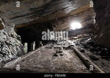 Tunnel of an abandoned lime mine in Switzerland Stock Photo