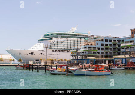 Freedom of the Seas cruise ship docked in Oranjestad, Aruba, Caribbean Stock Photo