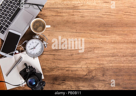 Accessories for spending free time lie on the desk. On the right side copyspace for your text Stock Photo