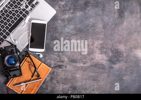 leisure devices arranged on a countertop and copy space on the right side Stock Photo