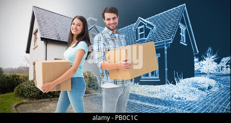 Composite image of happy young couple with moving boxes Stock Photo